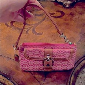 Coach hand purse.